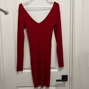 A red dress from No Comment in perfect condition.